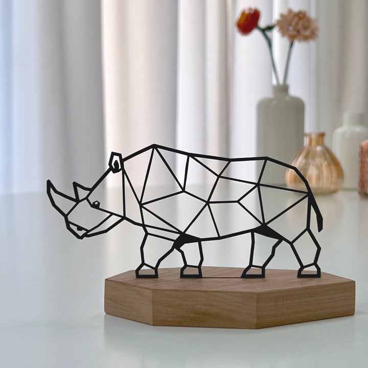 Stijlvolle neushoorn eettafel decoratie - duurzaam design van zwart karton en hout
